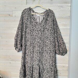 Women's dress ditsy floral black white ruffle hem.